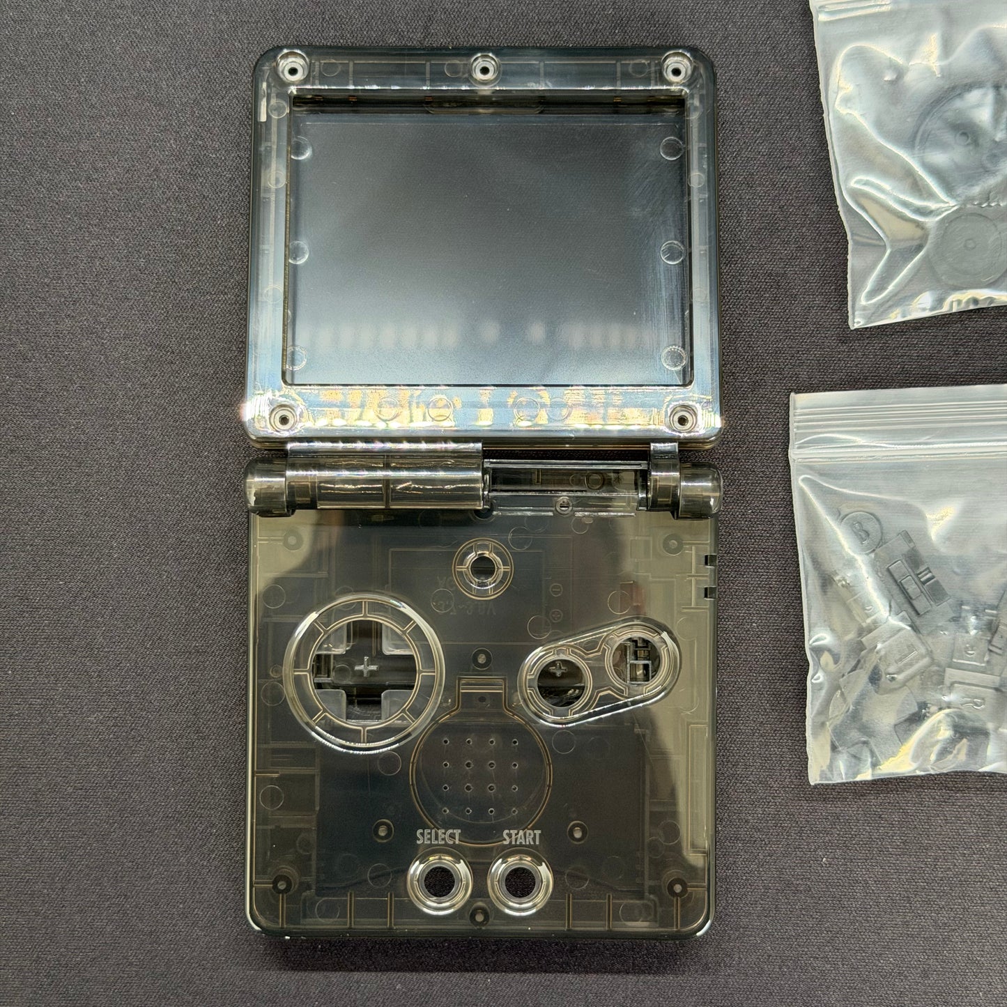 Game Boy Advance SP Full Replacement Shell Kit – Transparent Black Housing with Buttons